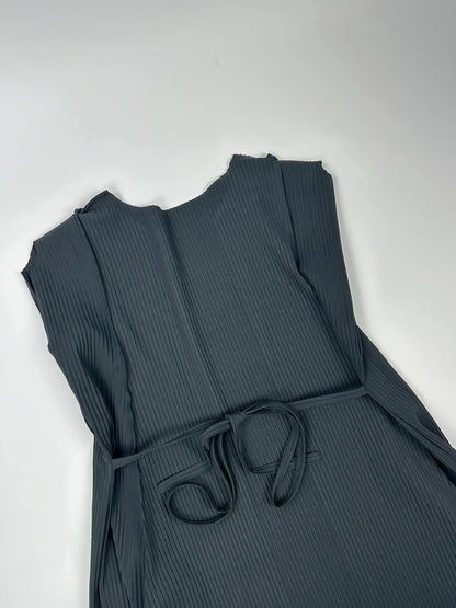 Issey Miyake black linen maxi dress with pleated design and unique string details.