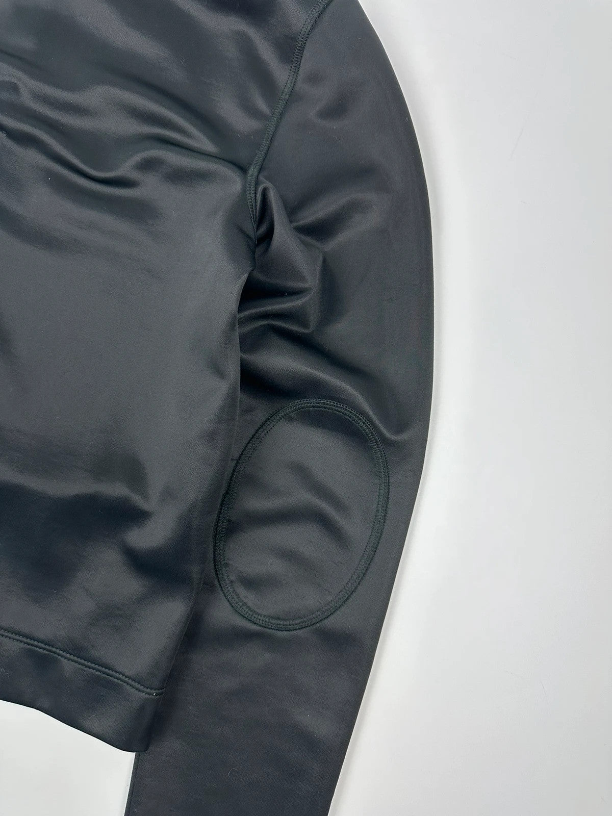 Prada black silk button-up jacket with rounded collar from SS2010 collection.