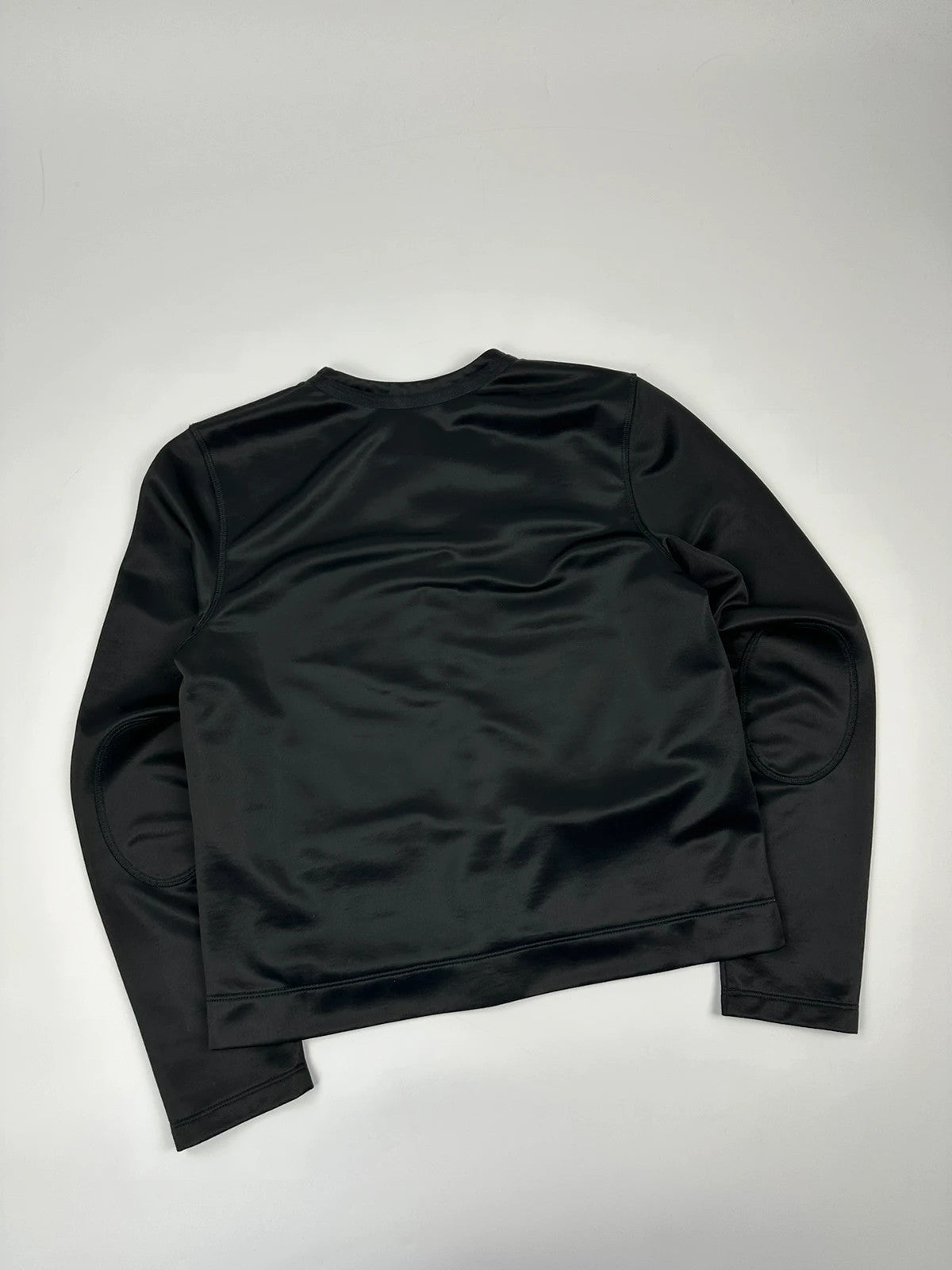 Prada black silk button-up jacket with rounded collar from SS2010 collection.