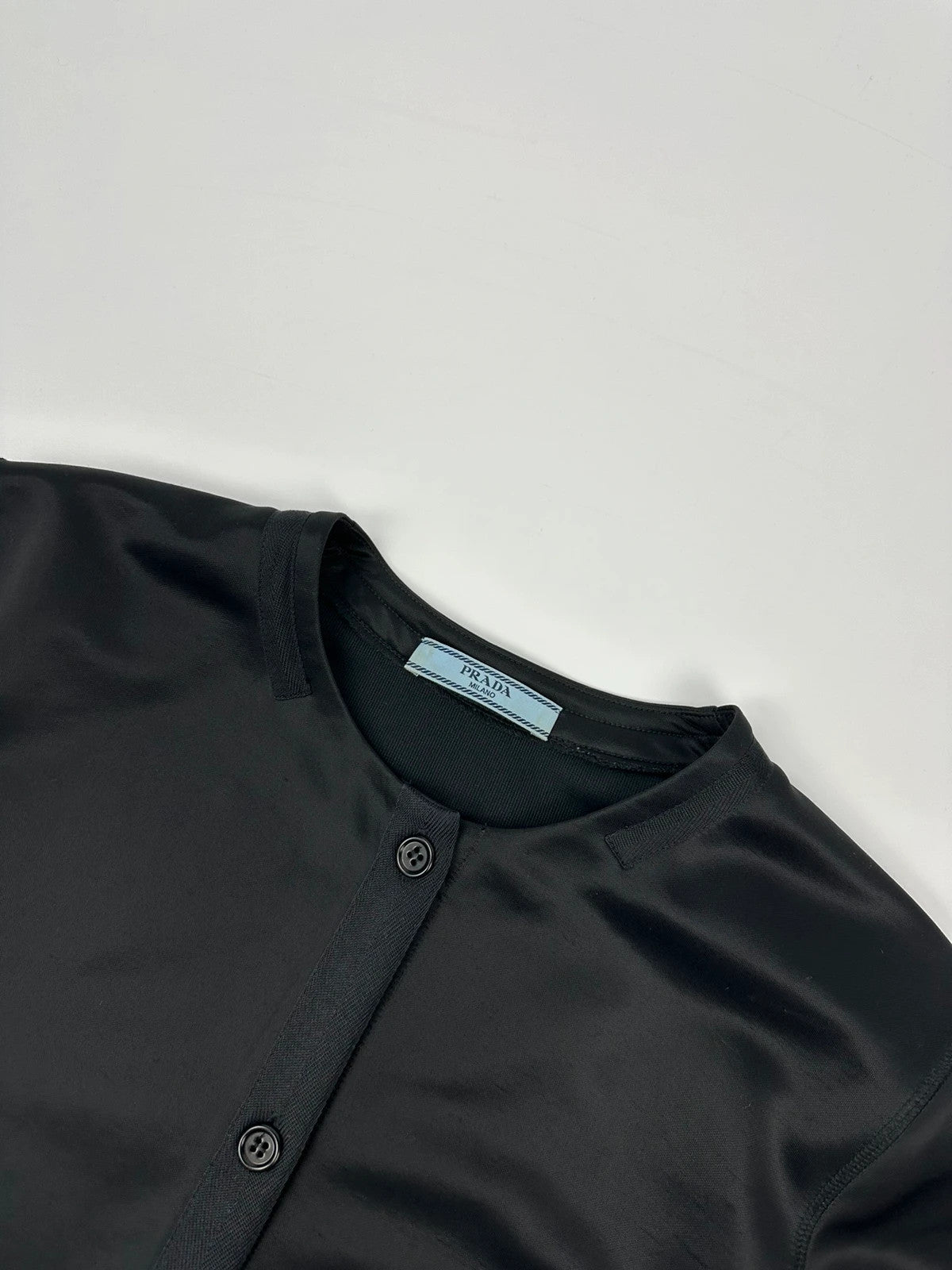 Prada black silk button-up jacket with rounded collar from SS2010 collection.