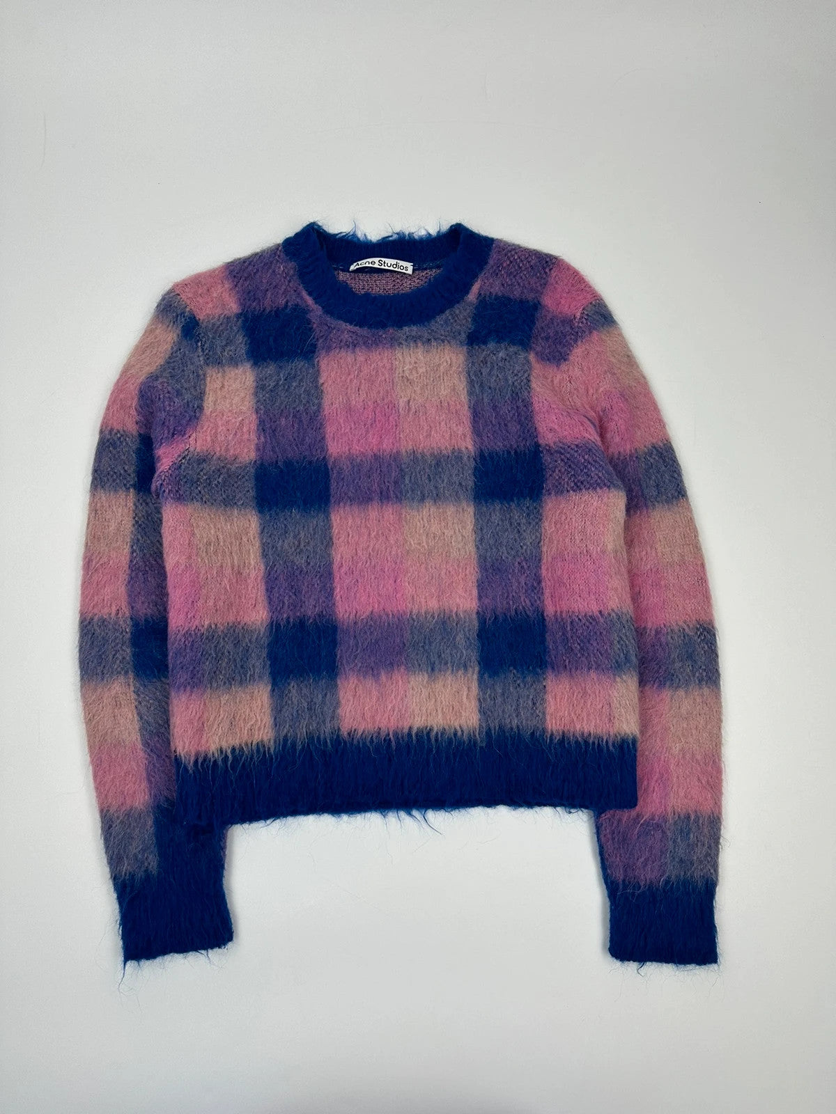 Acne Studios multicolor alpaca wool knit sweater with fuzzy texture and unique patterns.