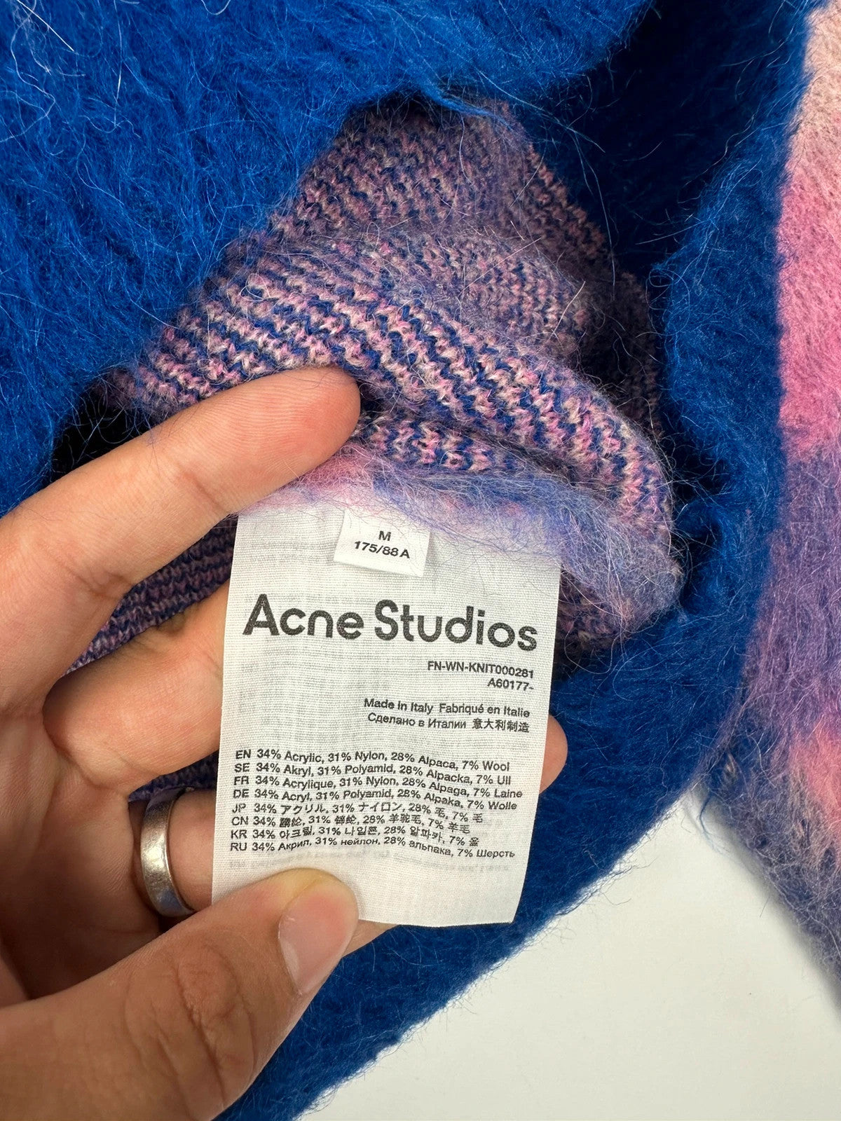 Acne Studios multicolor alpaca wool knit sweater with fuzzy texture and unique patterns.