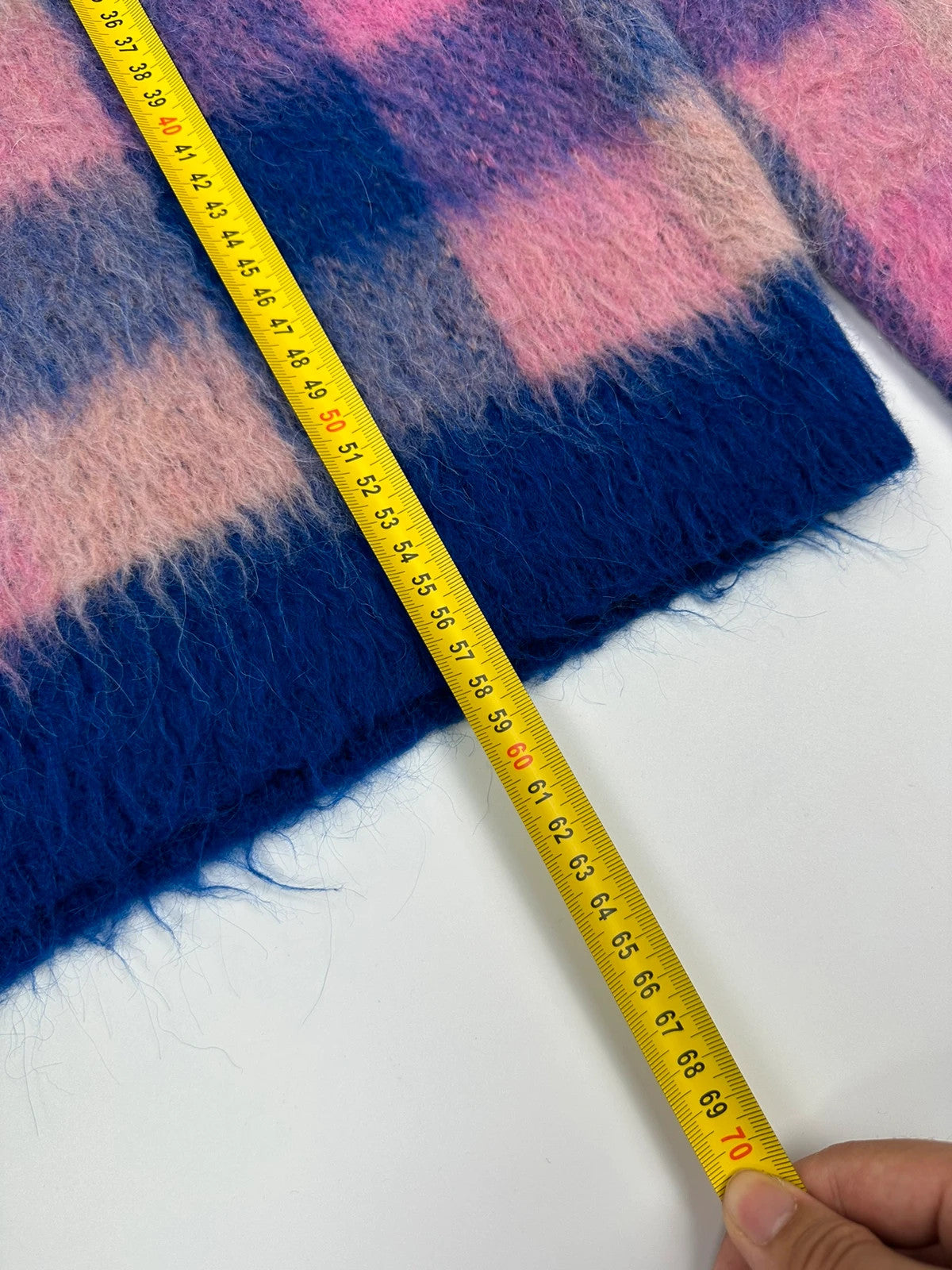 Acne Studios multicolor alpaca wool knit sweater with fuzzy texture and unique patterns.