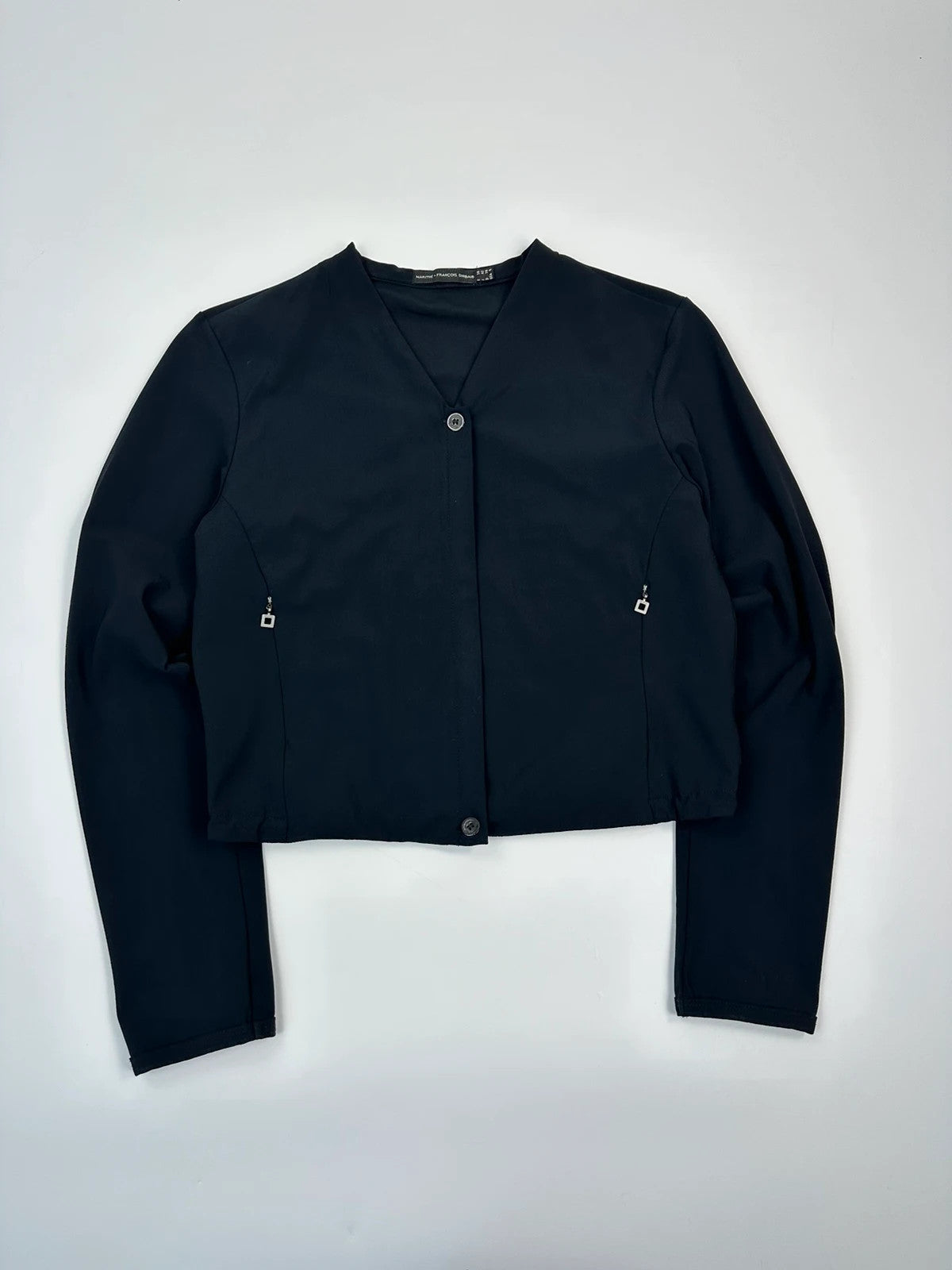 Marithé Francois Girbaud navy crop jacket with V-neck and minimalist design.