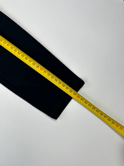 Marithé Francois Girbaud navy crop jacket with V-neck and minimalist design.