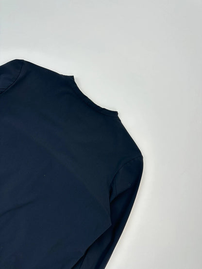 Marithé Francois Girbaud navy crop jacket with V-neck and minimalist design.