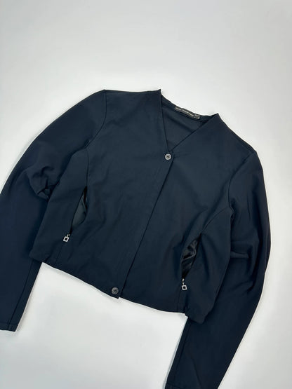 Marithé Francois Girbaud navy crop jacket with V-neck and minimalist design.