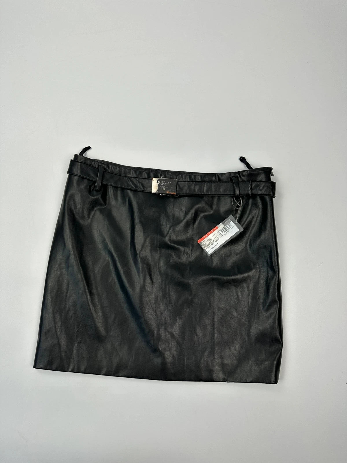 Prada black shiny mini skirt with logo waistband from SS2008 collection.