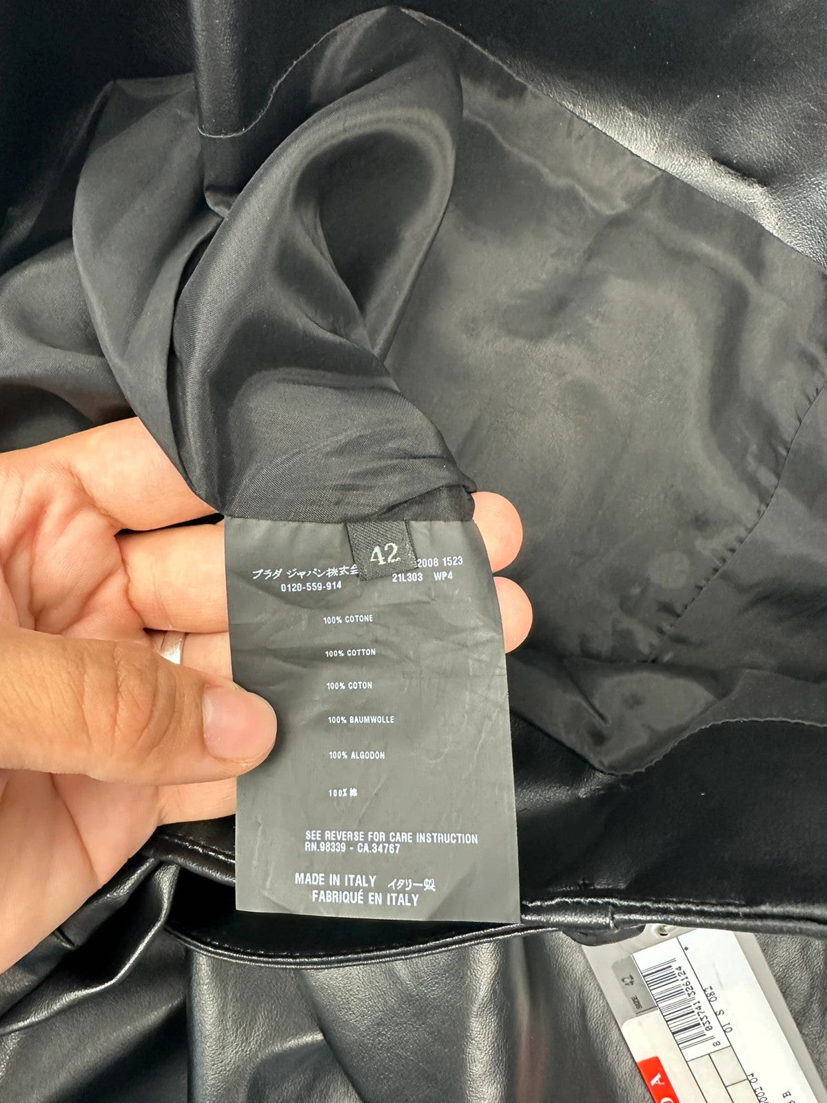 Prada black shiny mini skirt with logo waistband from SS2008 collection.