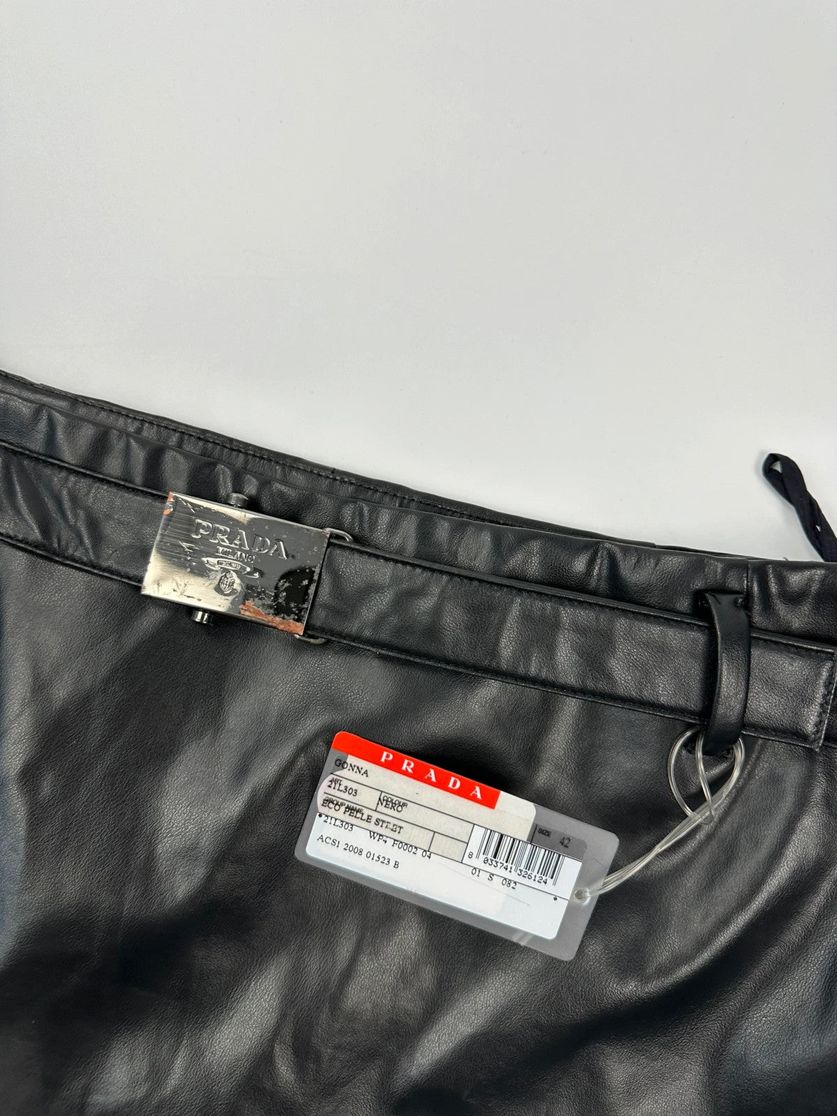 Prada black shiny mini skirt with logo waistband from SS2008 collection.