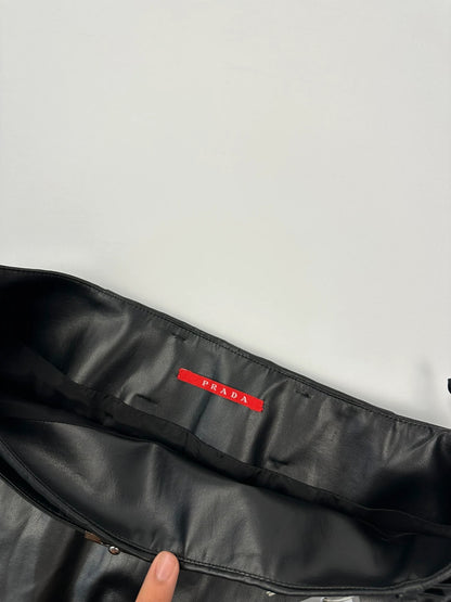 Prada black shiny mini skirt with logo waistband from SS2008 collection.