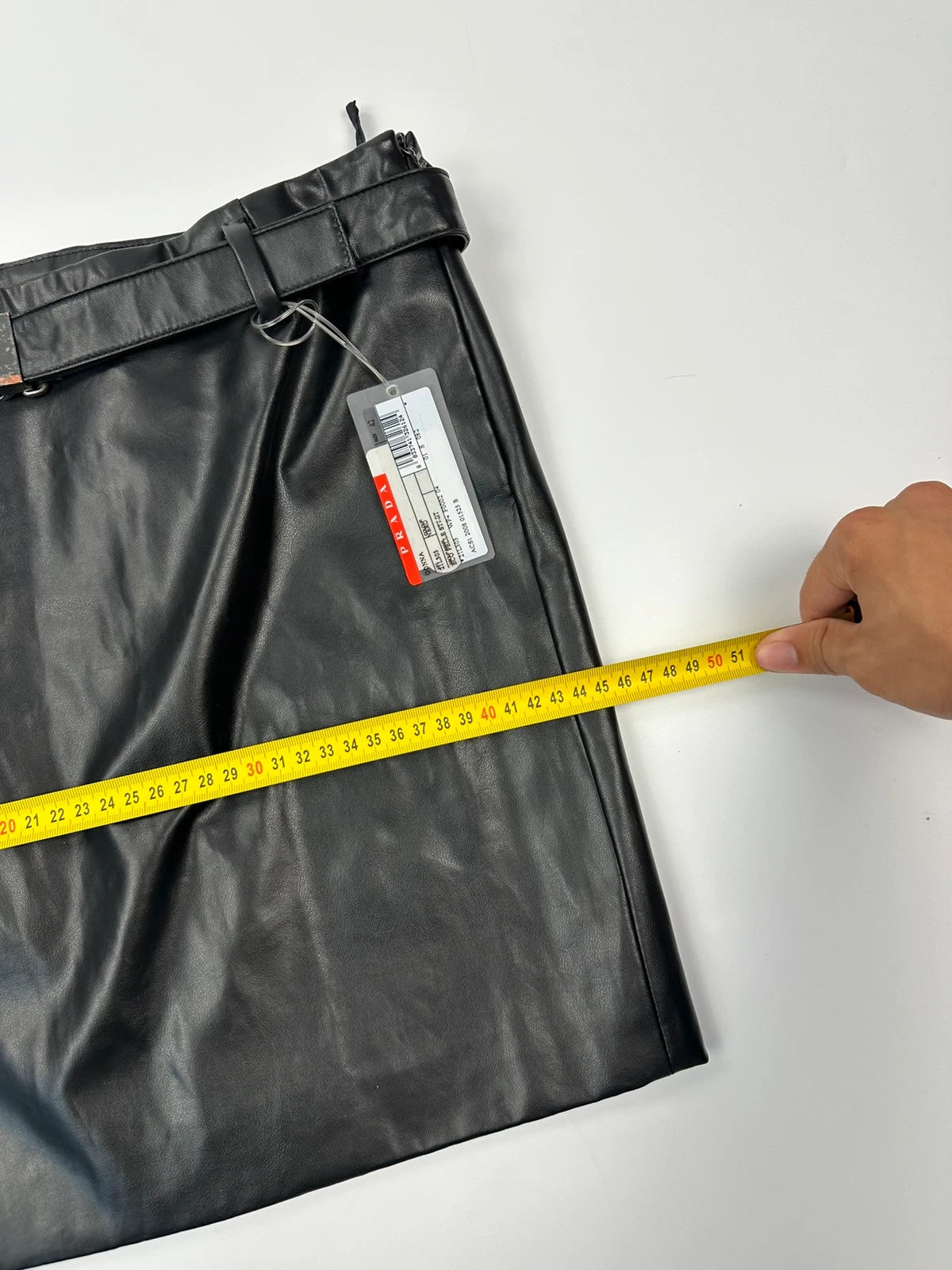Prada black shiny mini skirt with logo waistband from SS2008 collection.