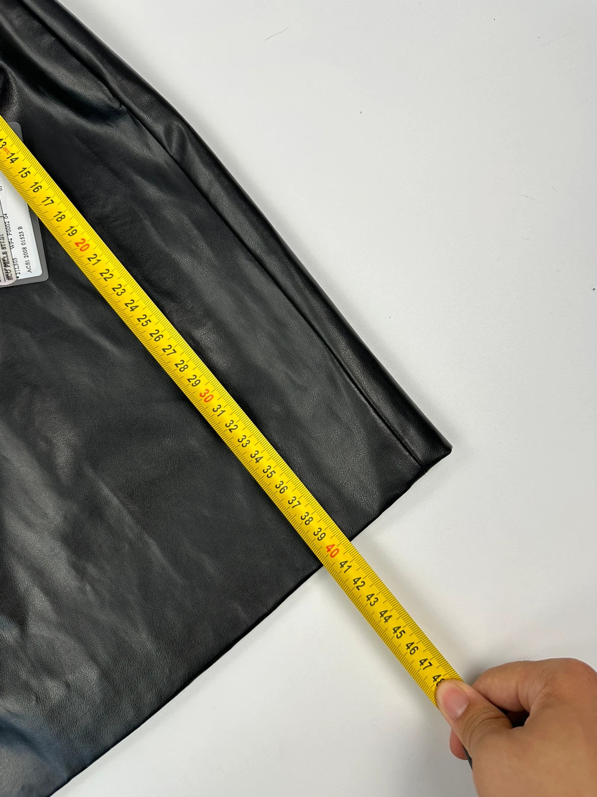 Prada black shiny mini skirt with logo waistband from SS2008 collection.