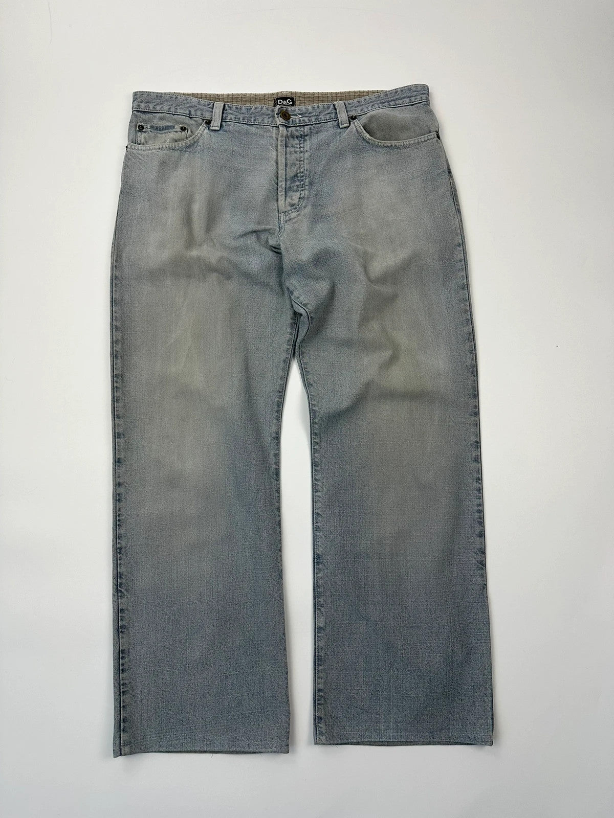 Dolce & Gabbana blue straight jeans with washed finish and back belt detail.