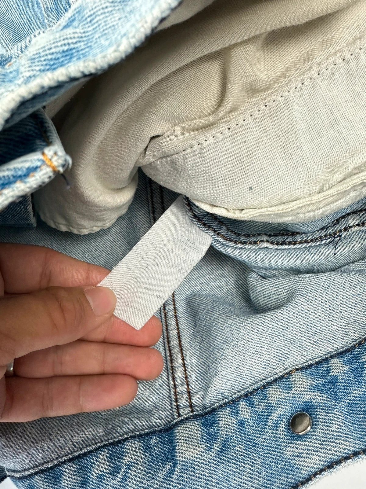 Armani Jeans blue denim jacket boxy cut with light wash and vintage 90s style.