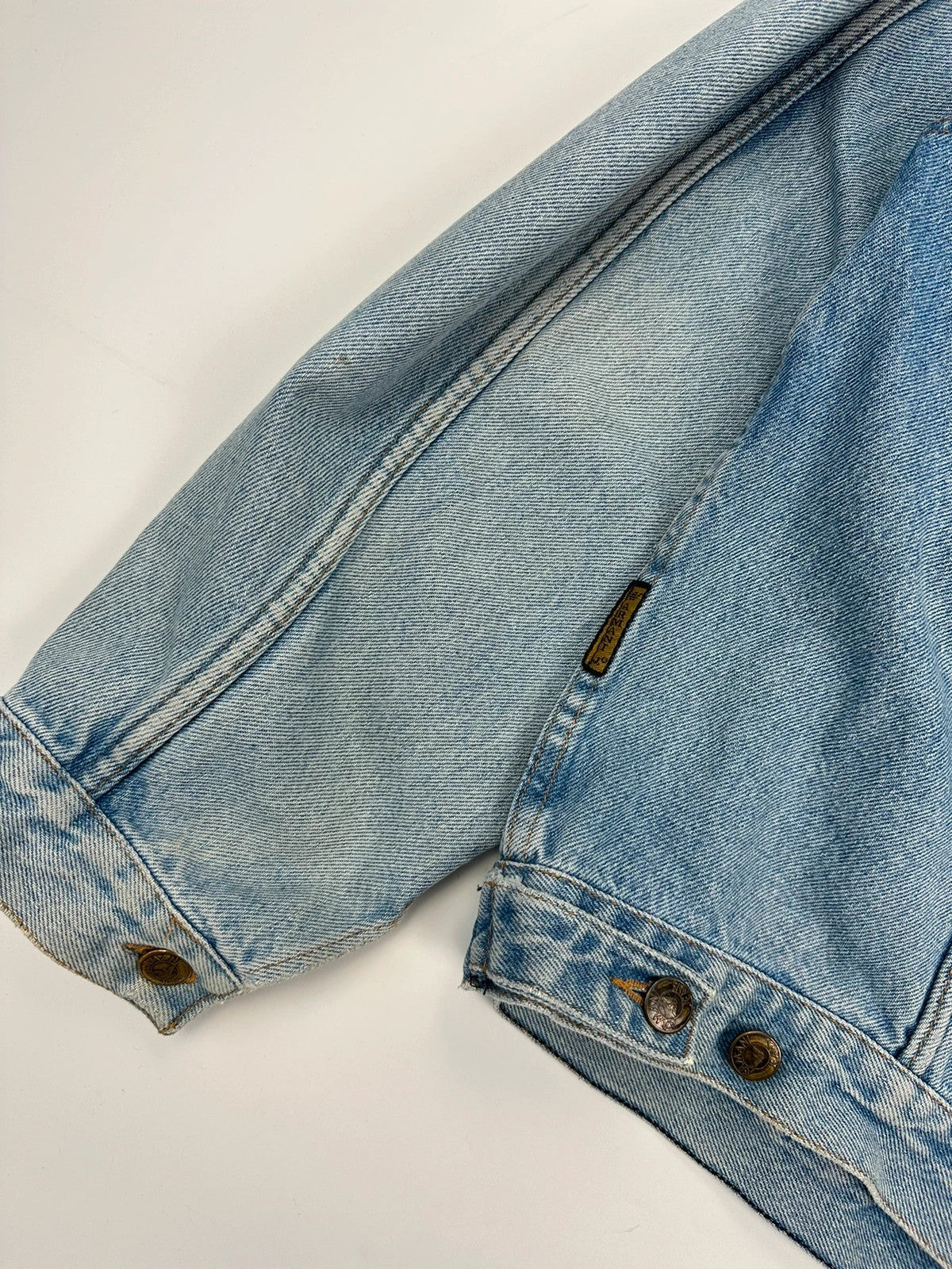 Armani Jeans blue denim jacket boxy cut with light wash and vintage 90s style.