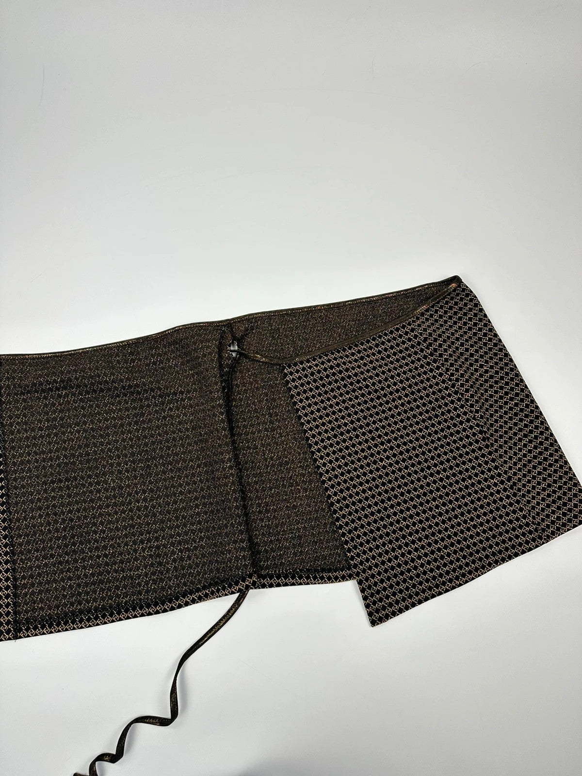 Fendi black and gold jacquard wrap skirt with woven monogram pattern and adjustable ties.