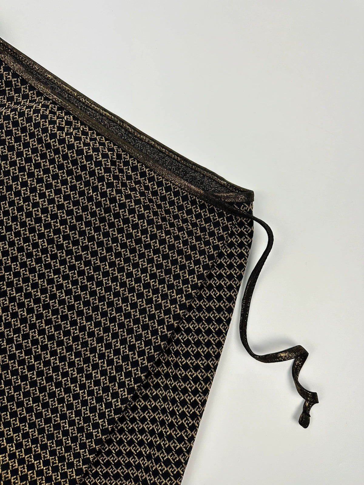 Fendi black and gold jacquard wrap skirt with woven monogram pattern and adjustable ties.