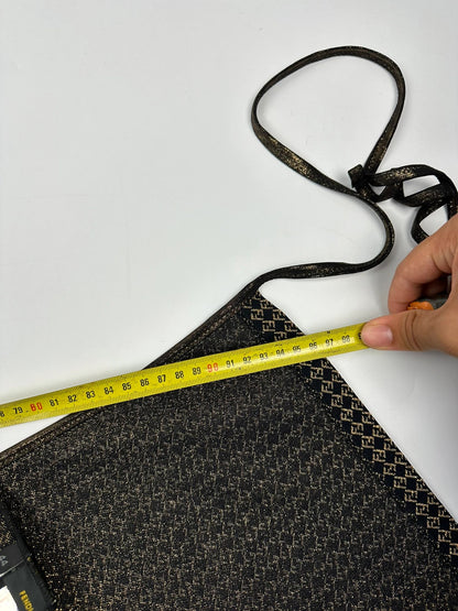 Fendi black and gold jacquard wrap skirt with woven monogram pattern and adjustable ties.