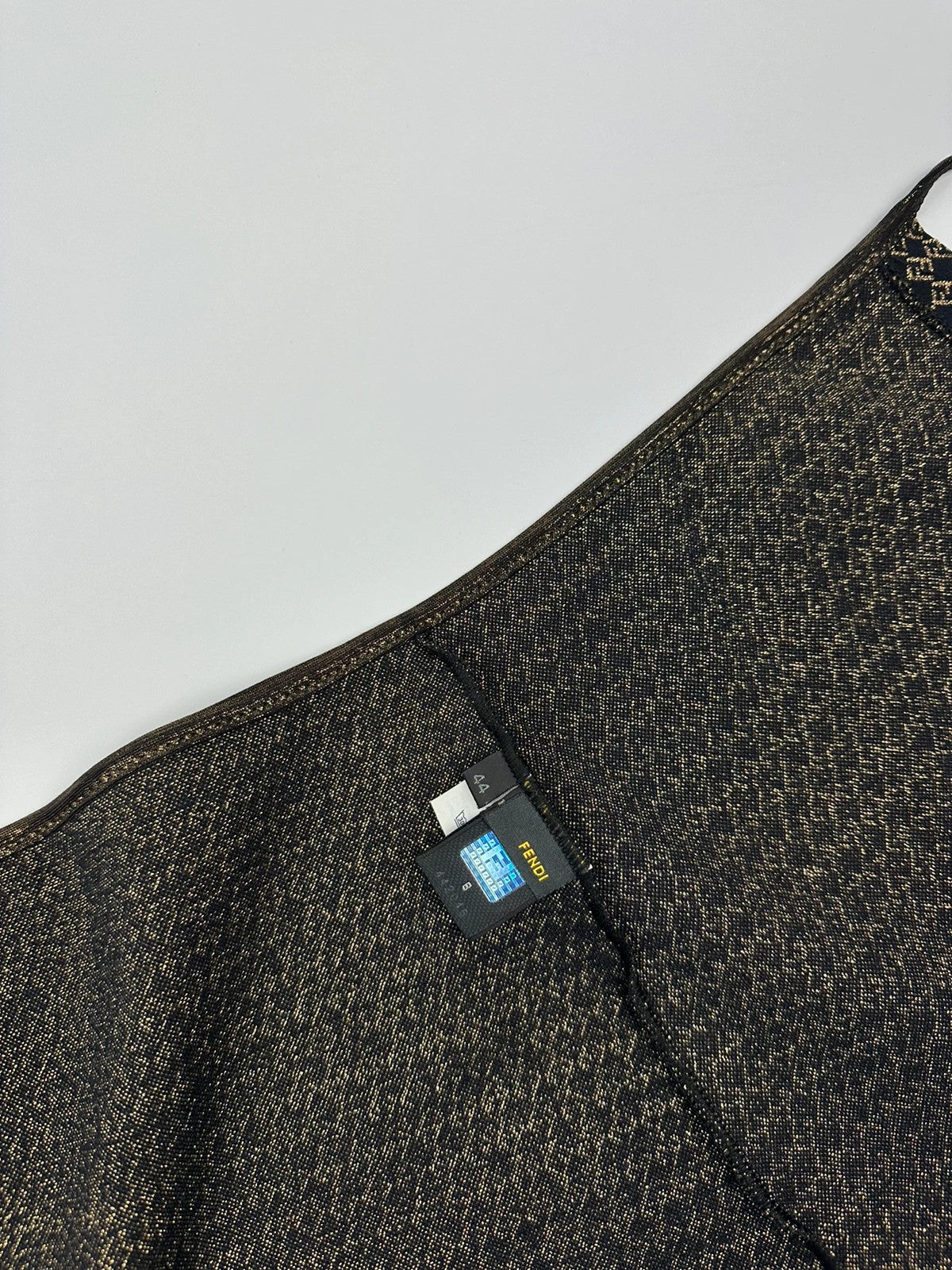 Fendi black and gold jacquard wrap skirt with woven monogram pattern and adjustable ties.