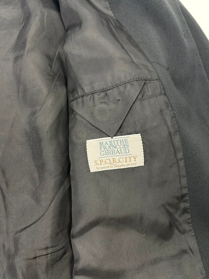 Marithé François Girbaud black jacket with adjustable shoulder pads and minimalist design.