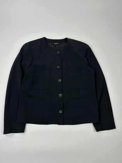 Marithé François Girbaud black jacket with adjustable shoulder pads and minimalist design.