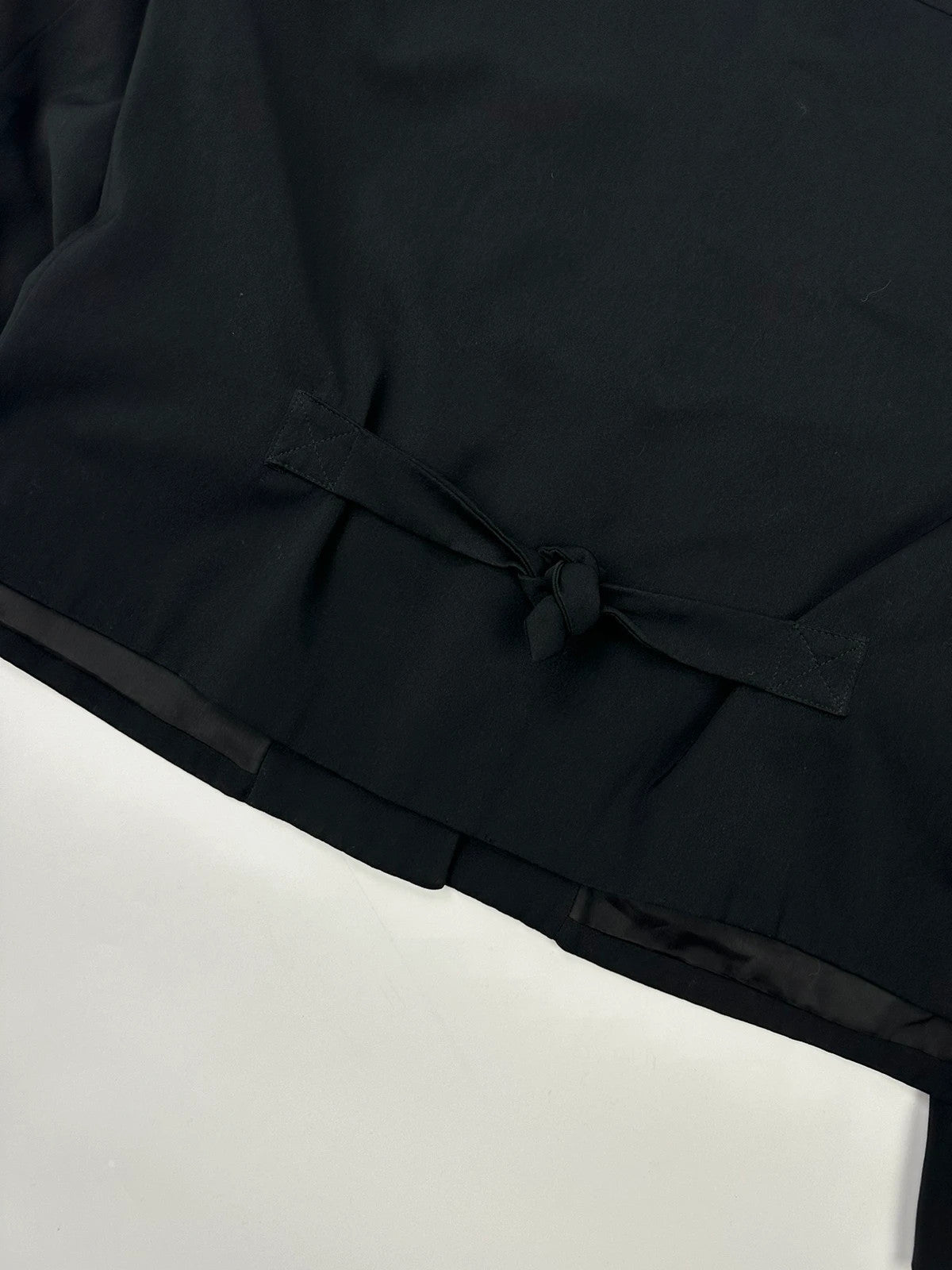 Marithé François Girbaud black jacket with adjustable shoulder pads and minimalist design.