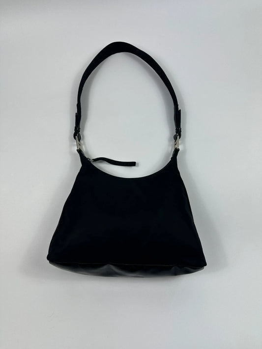 Prada black leather and nylon shoulder bag with logo detail and minimalist design.
