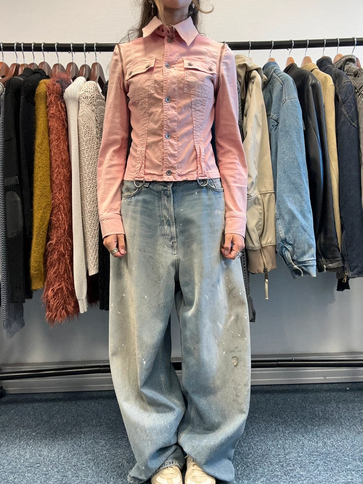Dolce & Gabbana orange and pink denim jacket with detachable sleeves and cargo pockets.