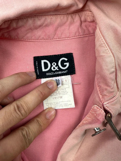 Dolce & Gabbana orange and pink denim jacket with detachable sleeves and cargo pockets.