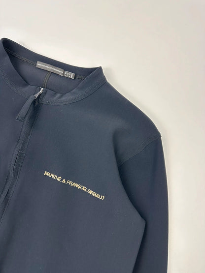 Marithé Francois Girbaud navy jacket minimalist design with subtle branding and smooth fabric.