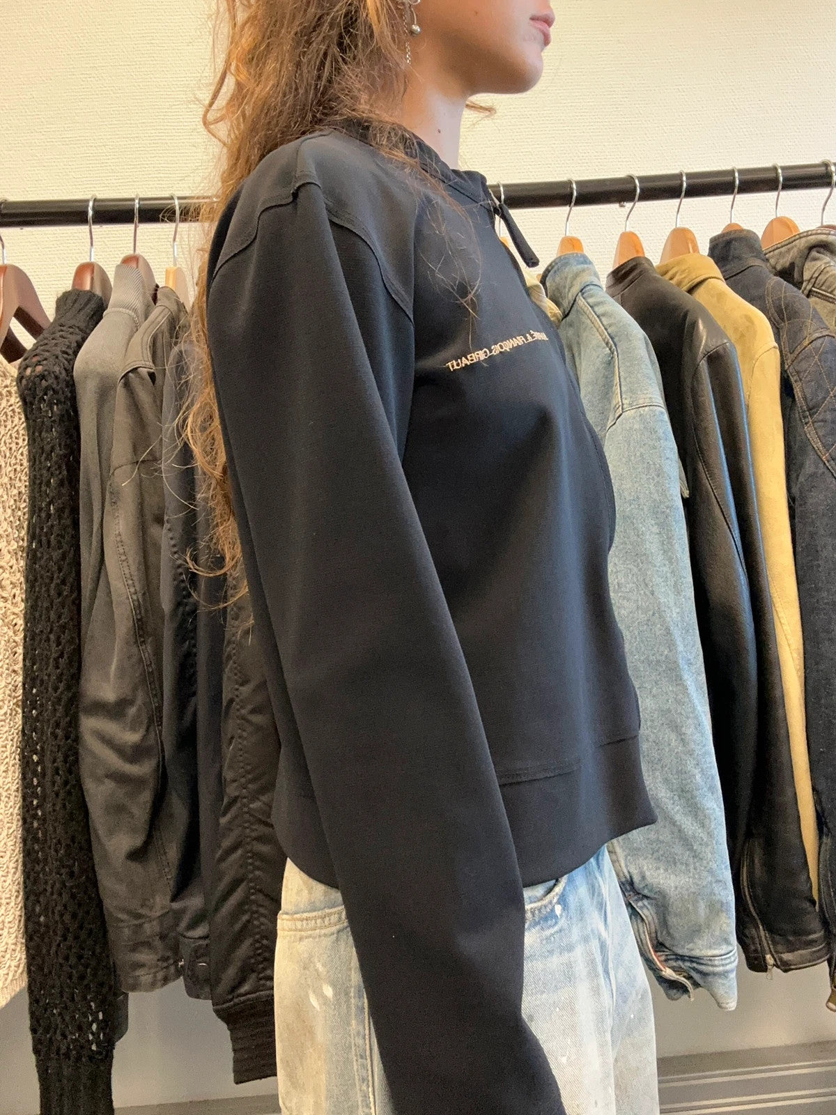 Marithé Francois Girbaud navy jacket minimalist design with subtle branding and smooth fabric.