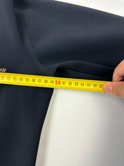 Marithé Francois Girbaud navy jacket minimalist design with subtle branding and smooth fabric.