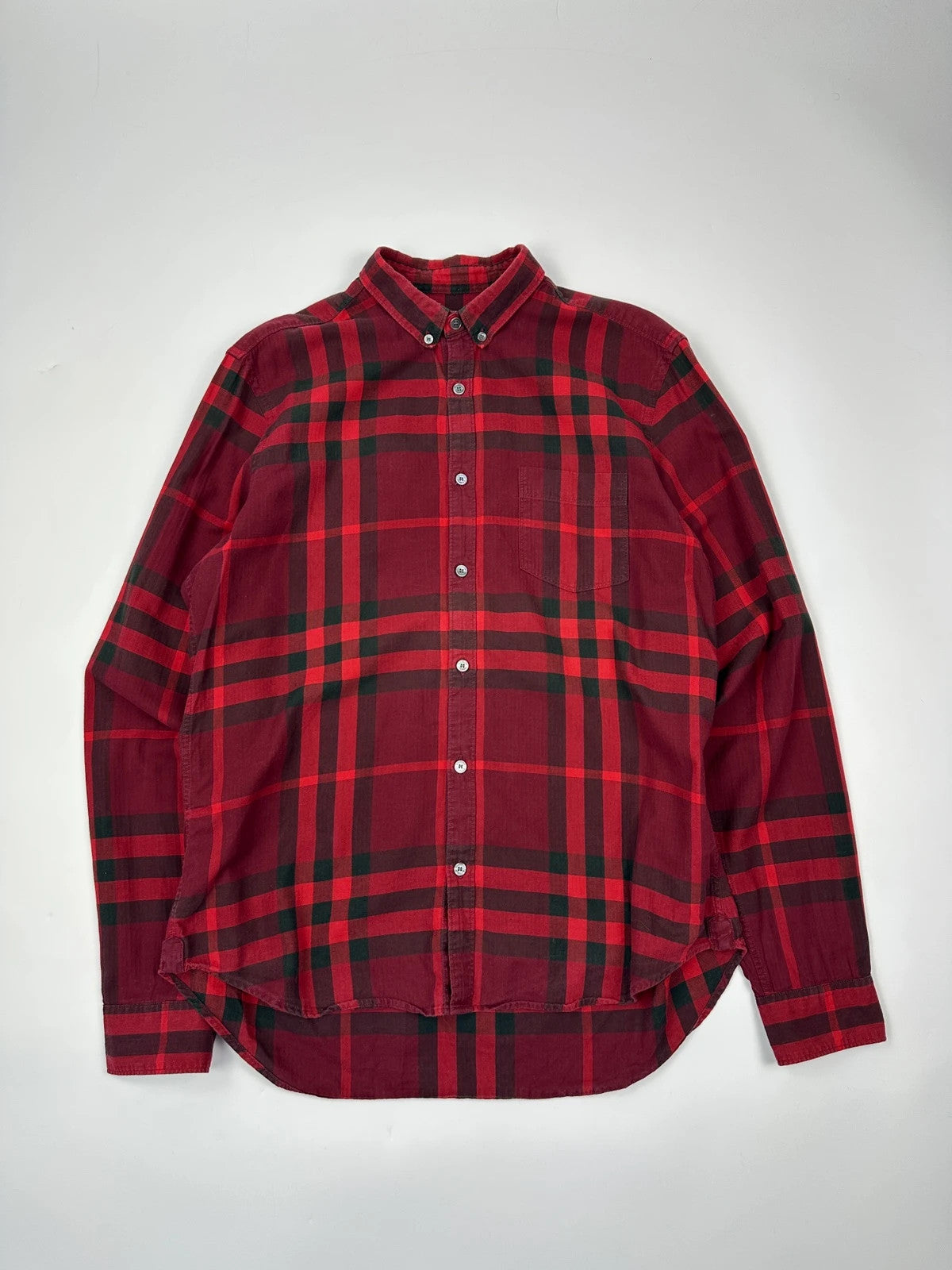 Burberry men's longsleeve shirt red and black checkered tartan pattern with logo detail.