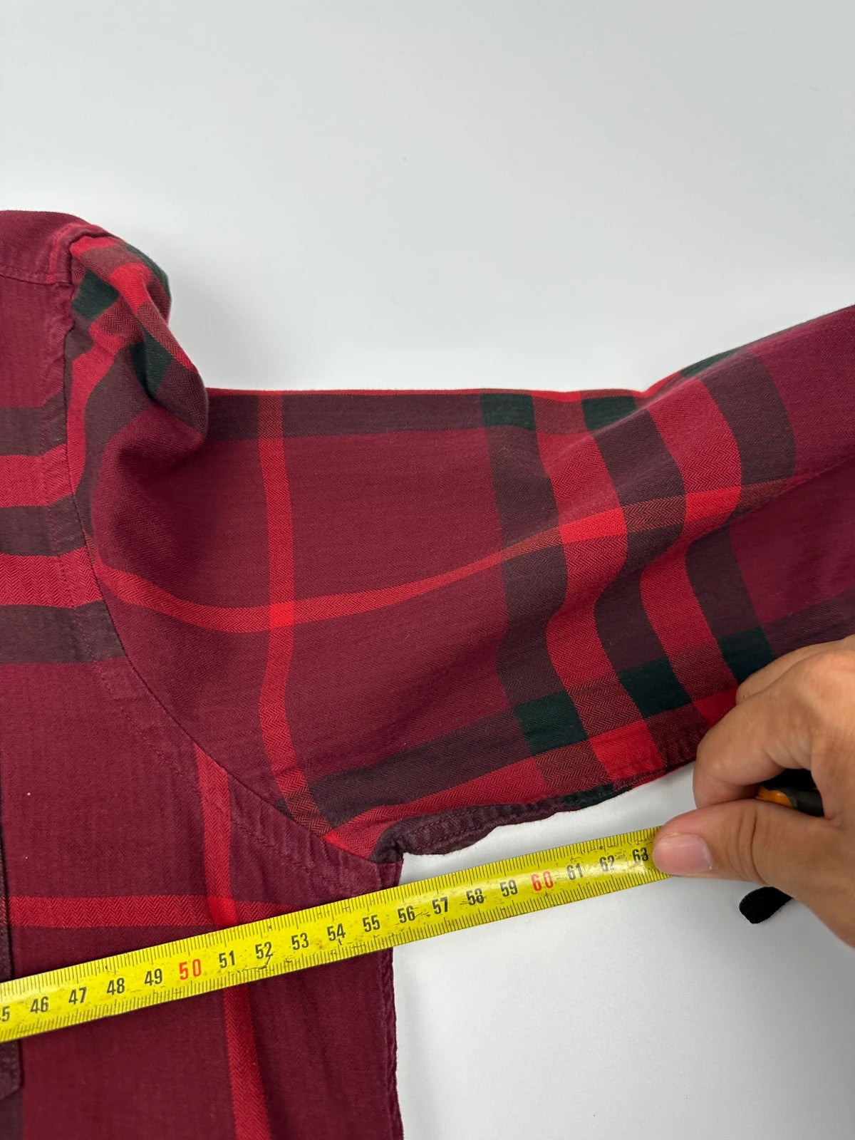 Burberry men's longsleeve shirt red and black checkered tartan pattern with logo detail.