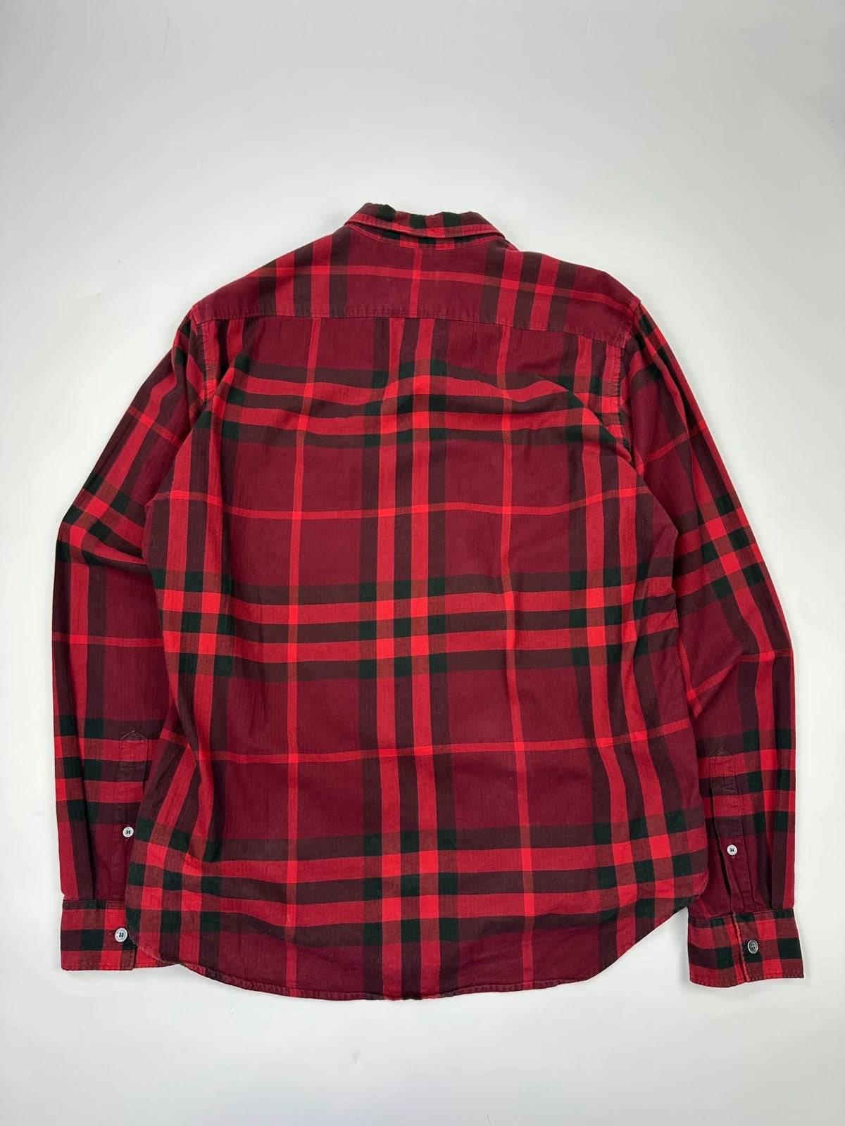 Burberry men's longsleeve shirt red and black checkered tartan pattern with logo detail.