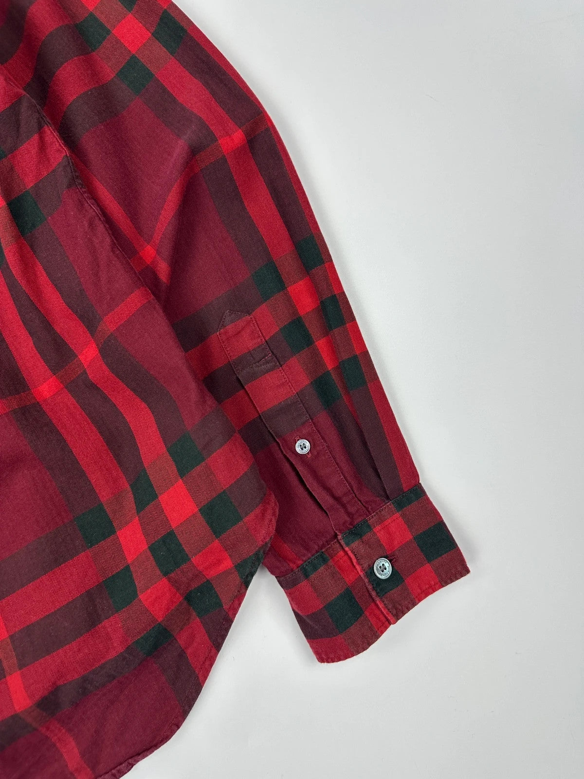 Burberry men's longsleeve shirt red and black checkered tartan pattern with logo detail.