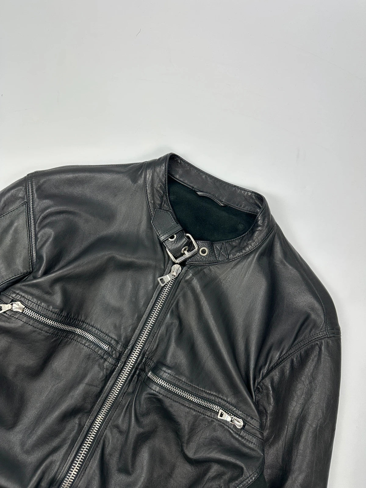 Prada black leather and cotton motor panel jacket with biker-style reinforced details.