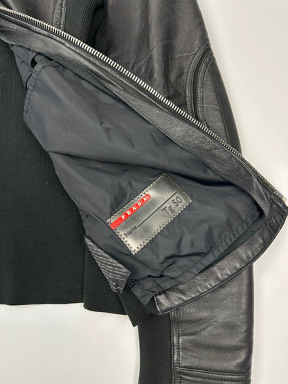 Prada black leather and cotton motor panel jacket with biker-style reinforced details.