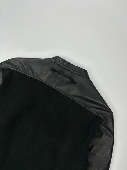 Prada black leather and cotton motor panel jacket with biker-style reinforced details.