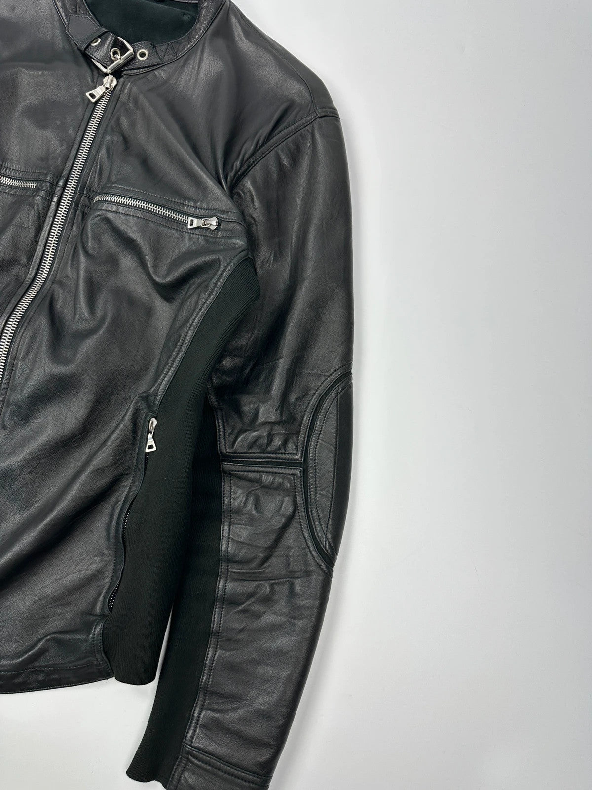 Prada black leather and cotton motor panel jacket with biker-style reinforced details.