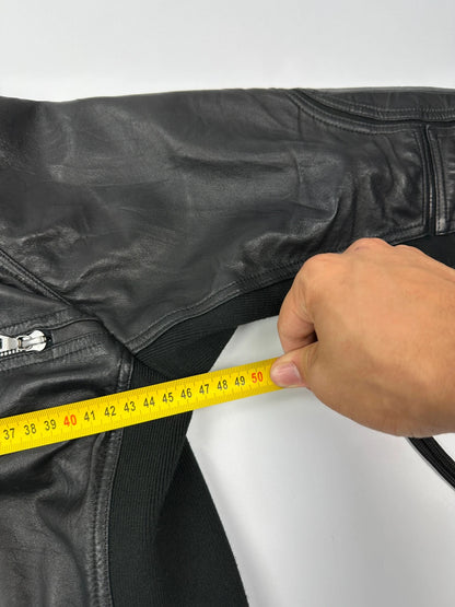 Prada black leather and cotton motor panel jacket with biker-style reinforced details.