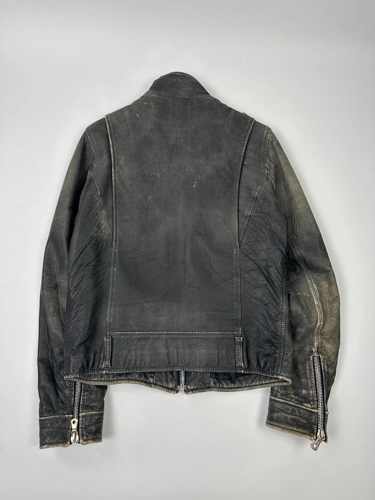 Dolce & Gabbana grey bomber jacket with unique eroded leather finish and faded details.