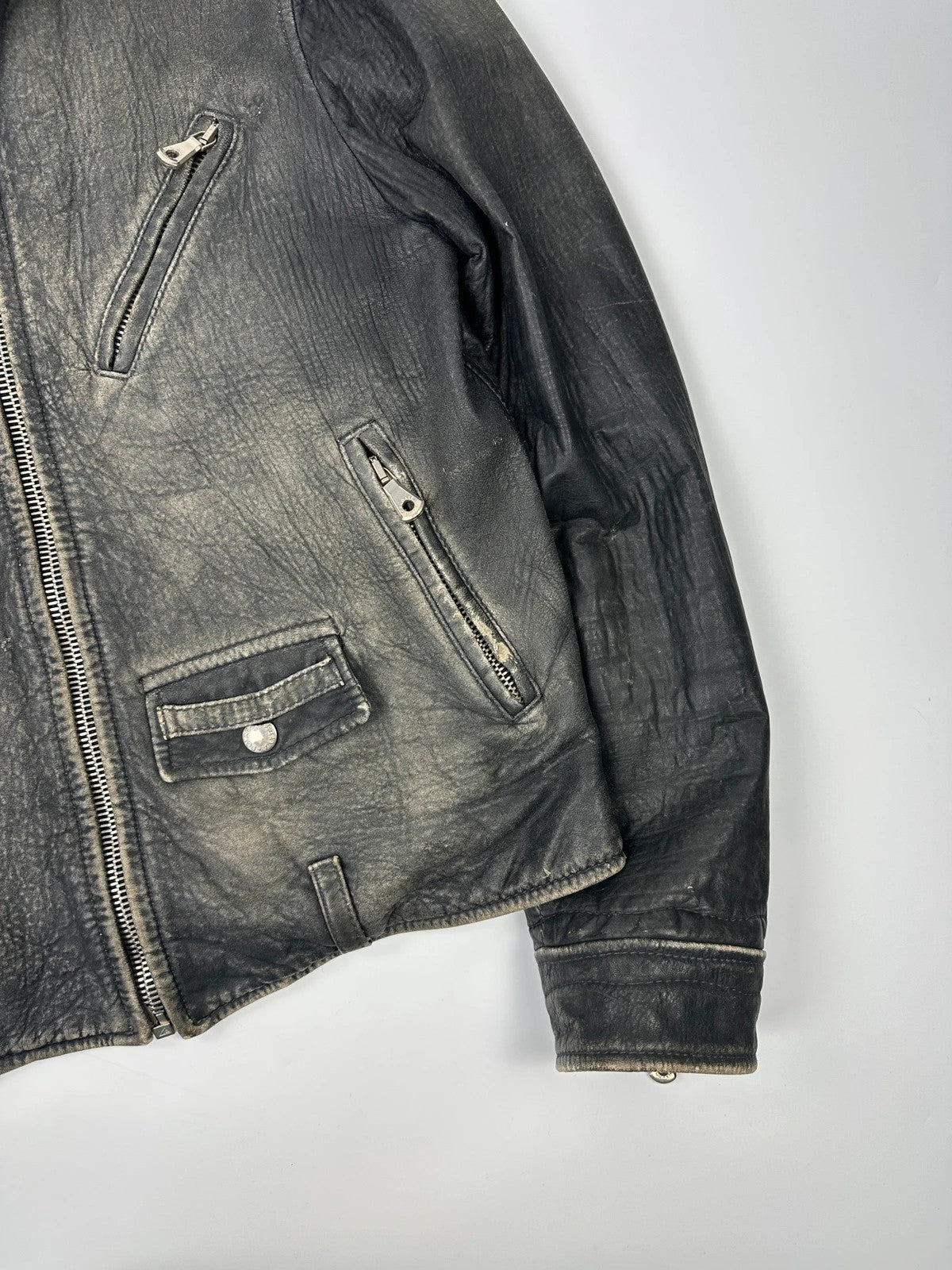 Dolce & Gabbana grey bomber jacket with unique eroded leather finish and faded details.