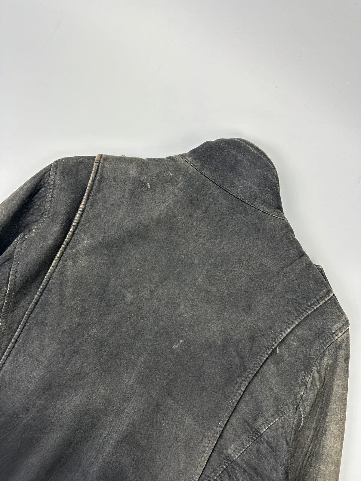 Dolce & Gabbana grey bomber jacket with unique eroded leather finish and faded details.
