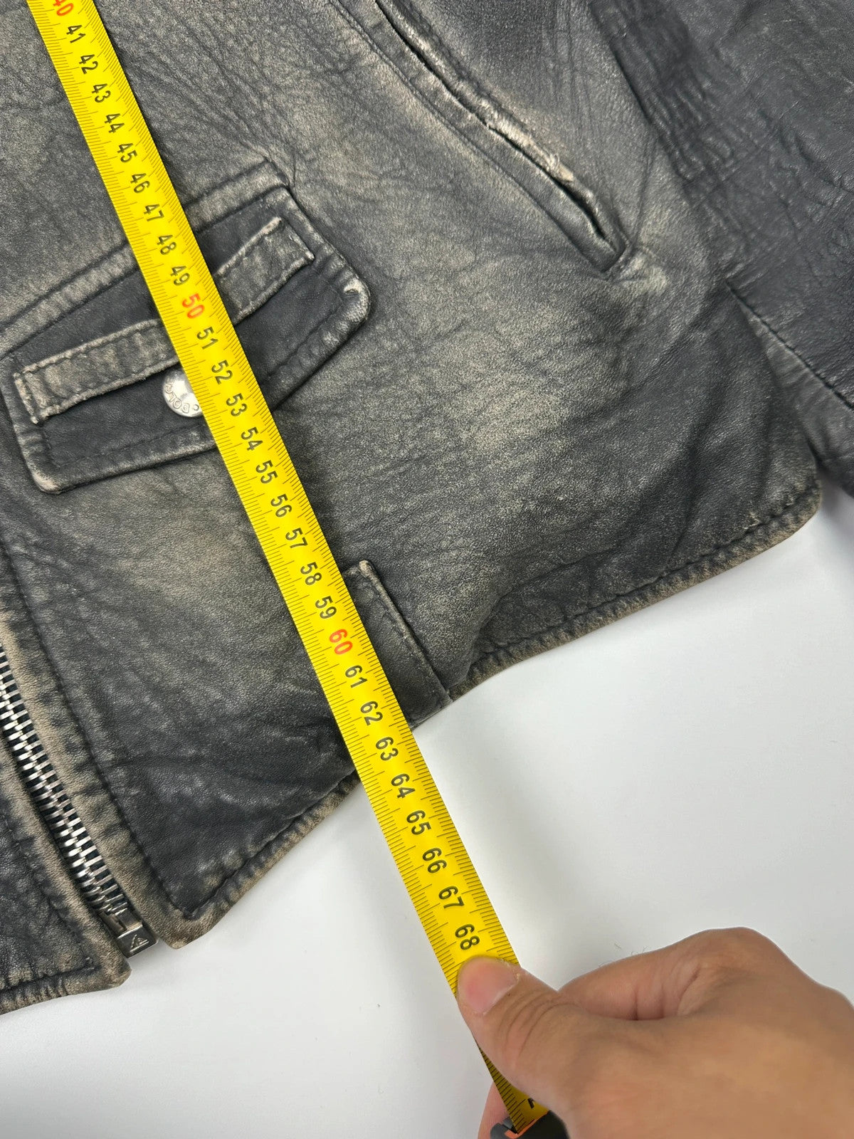 Dolce & Gabbana grey bomber jacket with unique eroded leather finish and faded details.