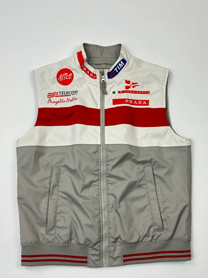 Prada red racing vest with white Luna Rossa logo and minimalist design.