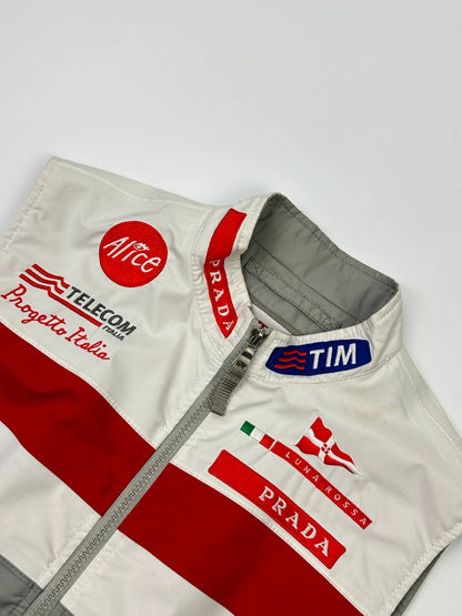 Prada red racing vest with white Luna Rossa logo and minimalist design.