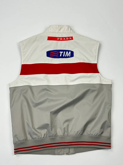 Prada red racing vest with white Luna Rossa logo and minimalist design.