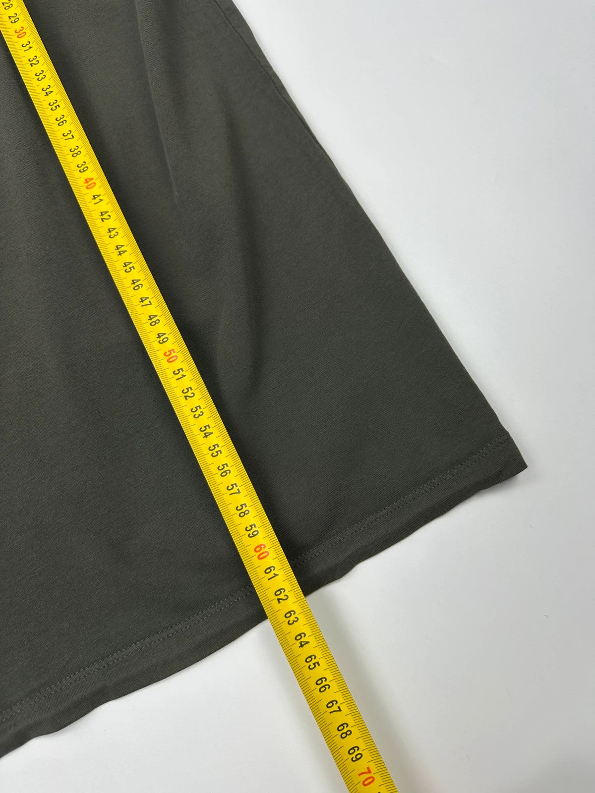 Prada khaki graphic t-shirt featuring zip chest pocket and minimalist design.